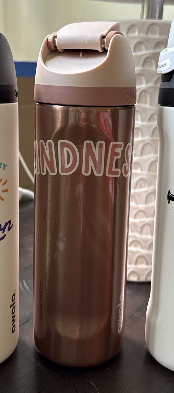 24oz Owala FreeSip water bottle in Rose Gold with the Kindness graphic by Cultivated Grace & Co.
