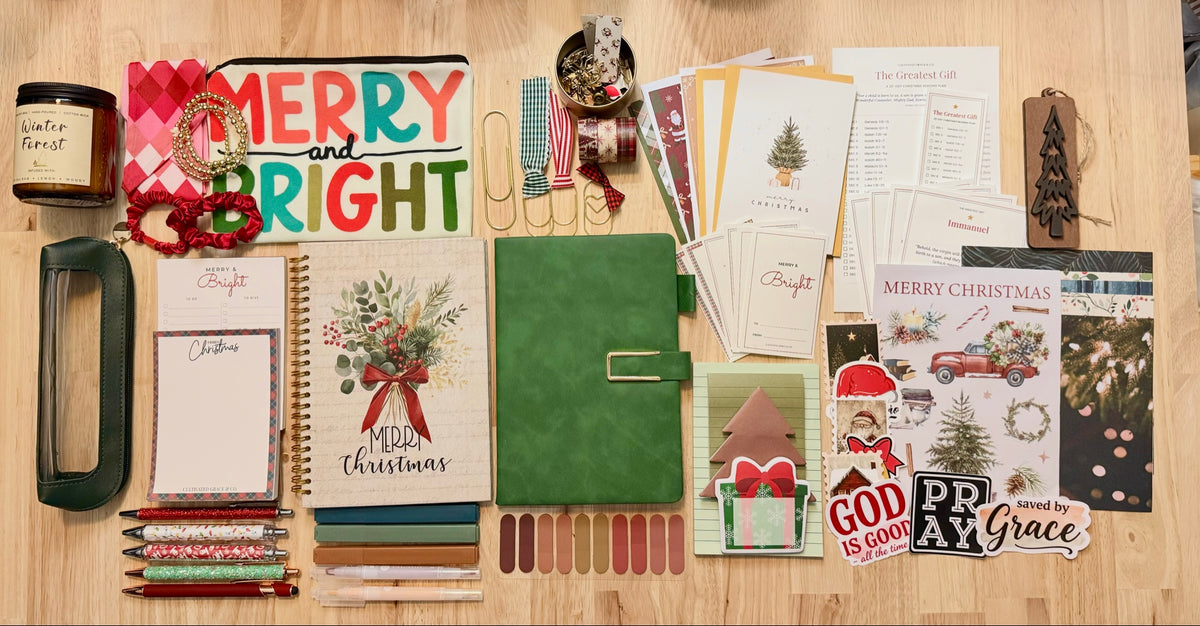 The Greatest Gift Christmas Box flat lay with the Evergreen journal