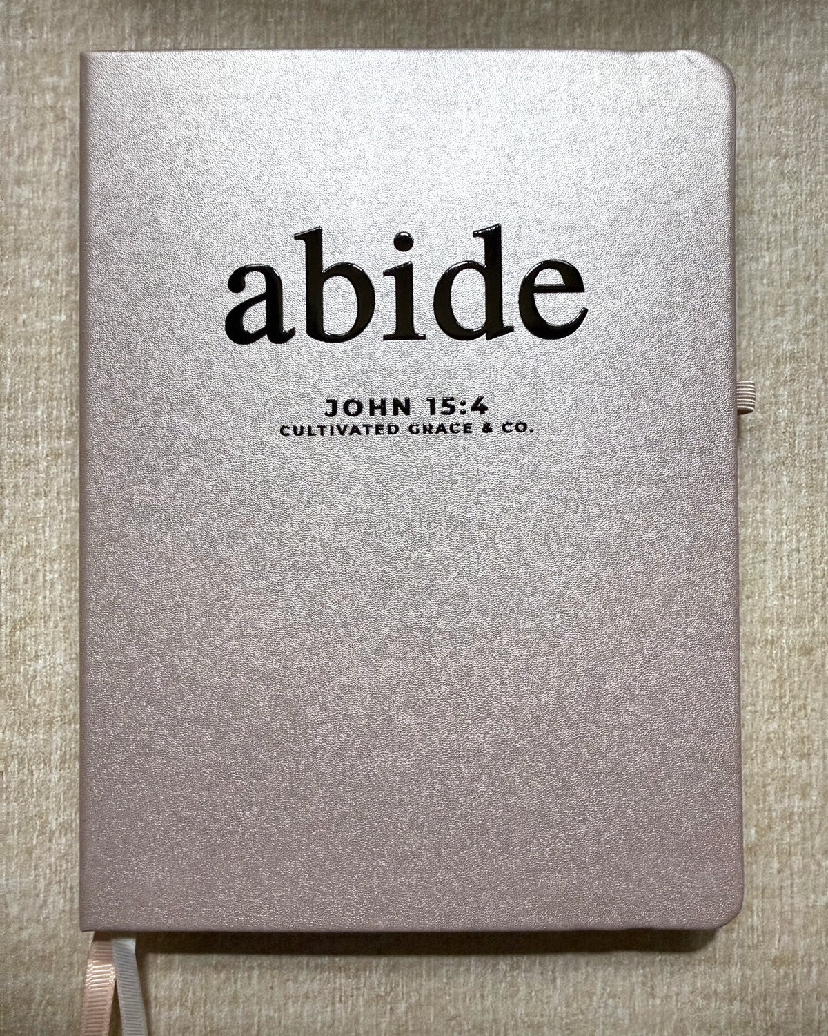 Abide faith word journal, print style, Shimmer Pink hardcover with Abide lettering