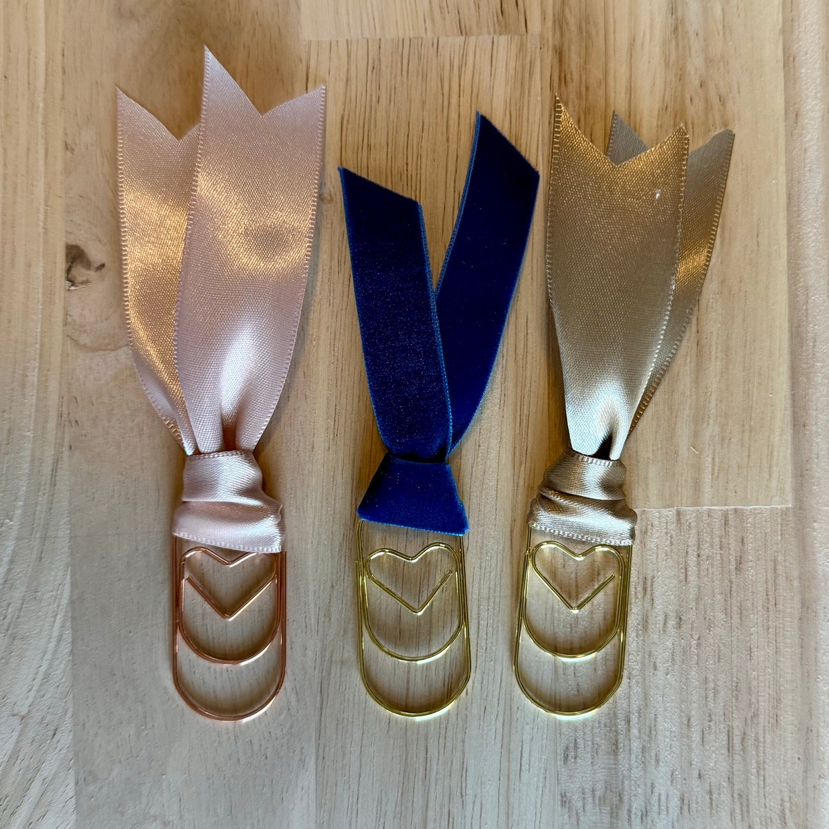 Holiday Neutral example set of 3 ribbon paperclip bookmarks: blush satin, navy velvet and champagne satin ribbons. Ribbons in your set will vary.