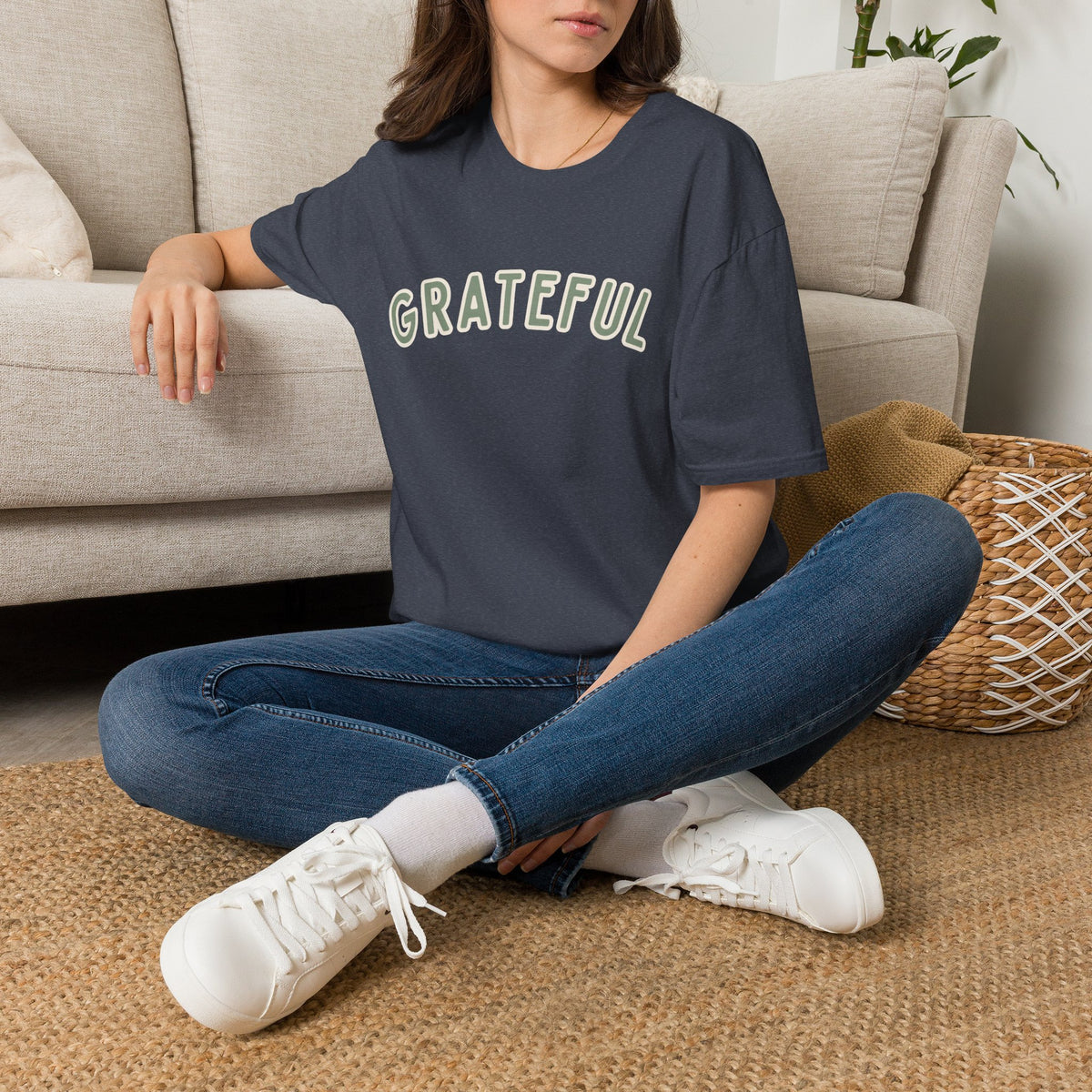 Grateful Softstyle T-Shirt in Heather Navy, sage green arched GRATEFUL lettering with cream outline, worn