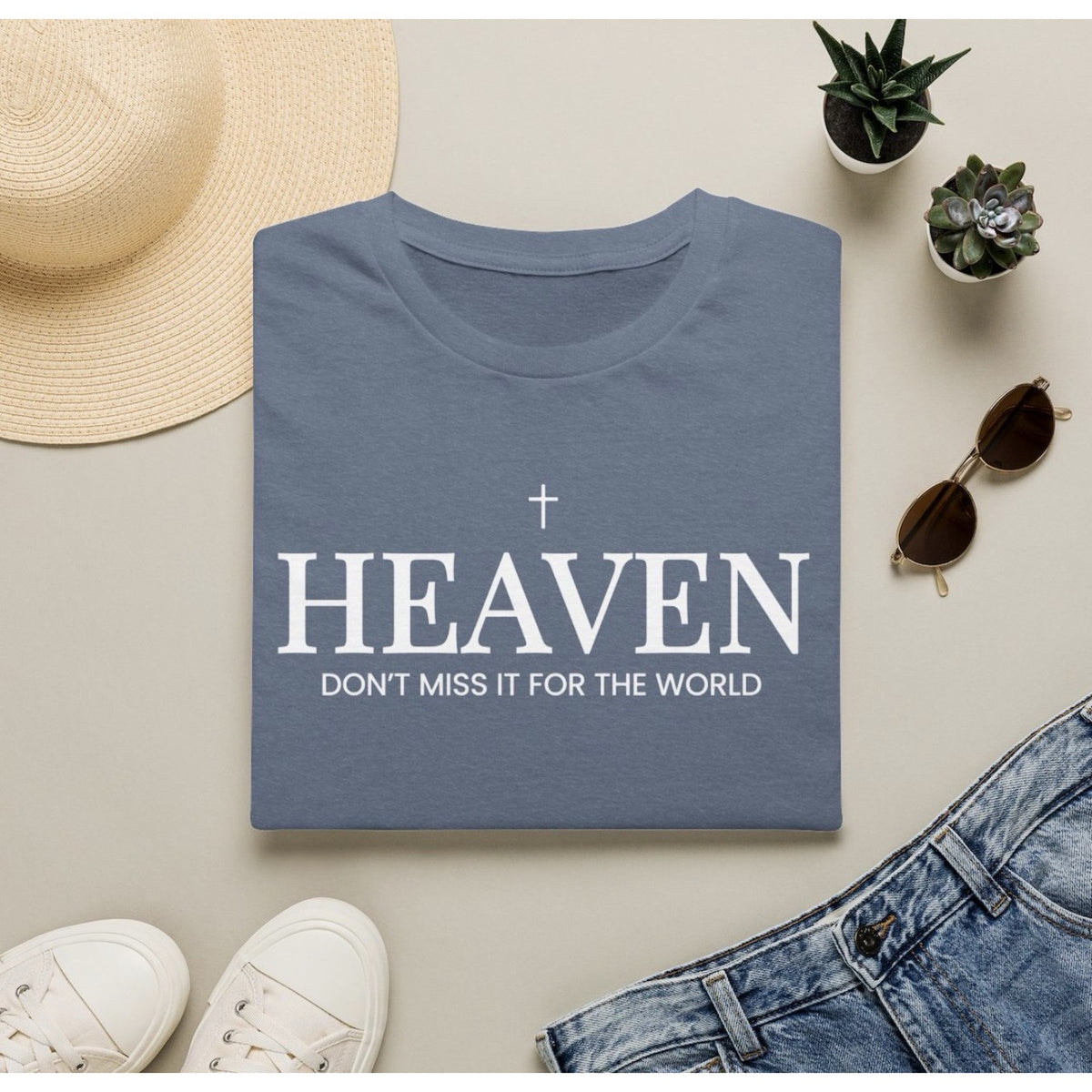 Heaven Don't Miss It for the World tee in Heather Indigo, folded flat lay
