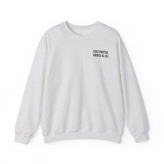 It Is Finished crewneck sweatshirt in Ash, front with Cultivated Grace & Co. left-chest wordmark