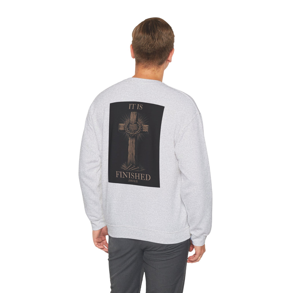 Man wearing the It Is Finished crewneck sweatshirt in Ash, back view