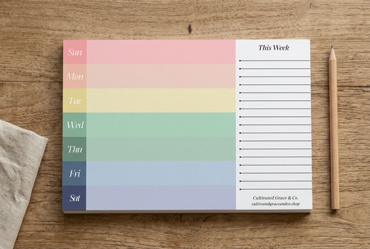 Landscape weekly desk planner on a rustic wood table