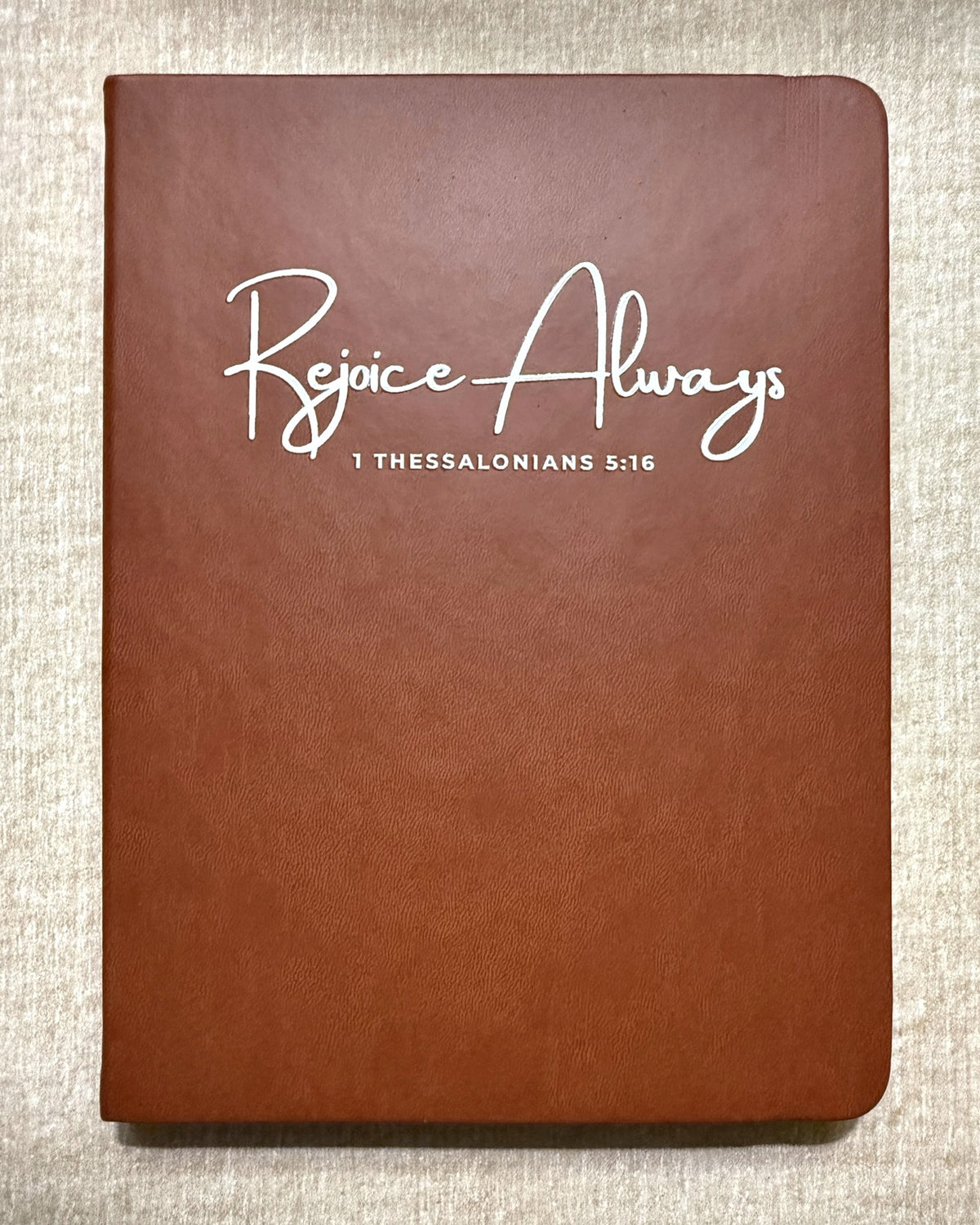 Rejoice Always faith word journal, script style, Cognac hardcover with Rejoice Always lettering