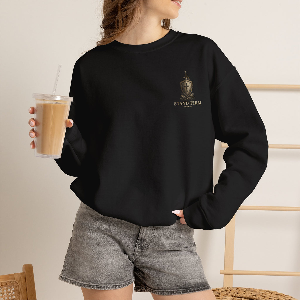 Stand Firm sweatshirt in Black shown on a model, front lifestyle view