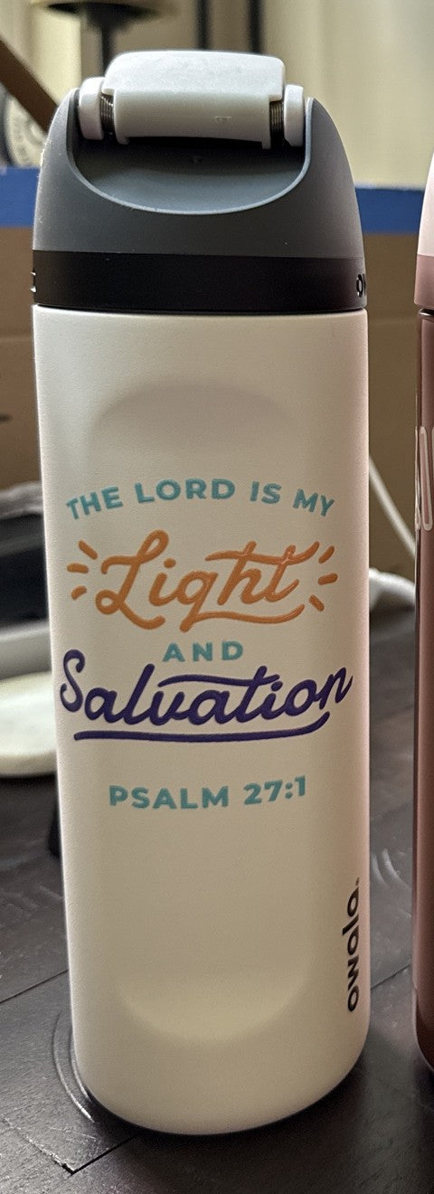 24oz Owala FreeSip water bottle in White with the The Lord Is My Light and Salvation graphic by Cultivated Grace & Co.