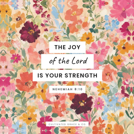 Wildflower scripture card (BSB): The Joy of the Lord Is Your Strength, Nehemiah 8:10, painted wildflower background with white lettering labels
